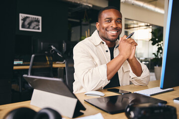Young Black Male Advertising Marketing Or Design Creative In Modern Office Sitting At Desk Working...