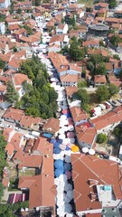 Fototapeta premium Aerial view of the street market set up in the neighborhood