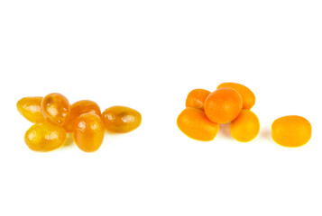 Candied and fresh cumquat or kumquat isolated on white background