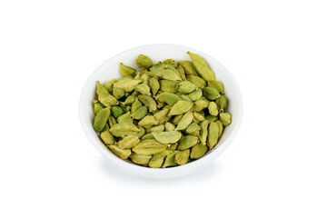 Cardamon in a white bowl isolated on white background