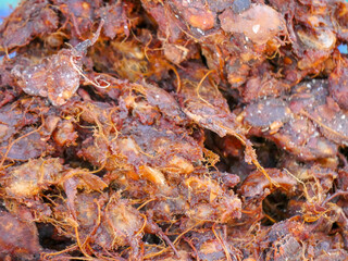 Heap of Tamarind imli selling in Indian shop as spice. Tamarind known as Imli in India is a widely used spice-condiment in India.