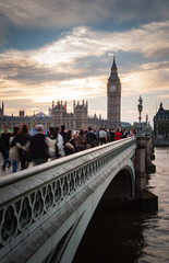 Commuter rush hour, Big Ben, London. Office workers making their way across Westminster Bridge with...