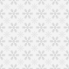 Seamless white decorative christmas pattern with snowflakes