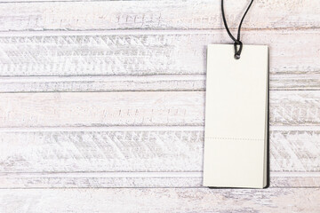 new Blank tag on a light wooden background