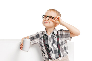 Portrait of cute little boy, happy kid in eyeglasses and hat isolated on white studio background with copyspace for ad. Retro vintage style concept