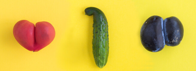 Ugly fruit and vegetable on the yellow background. Top view. Closeup.