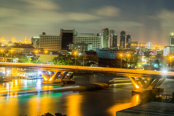 Fototapeta na wymiar Khlong San,Bang Rak,Sathorn,Bangkok,Thailand on February 18,2019:Night scape of King Taksin Bridge(Sathorn Bridge) and Bangkok skyline.