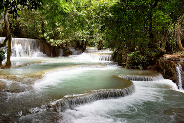 Tat Kuang Si Waterfalls is one of the waterfalls. Located about 32 kilometers from Luang Prabang, Laos, it is known as the most beautiful waterfall of Luang Prabang. Laos PDR,