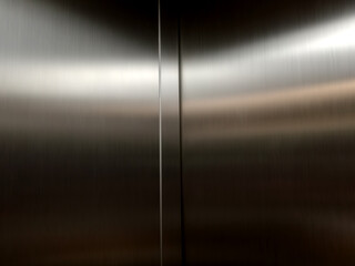 Reflection of light on a shiny metal texture,stainless steel background.