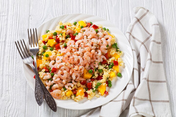 shrimps and millet pilaf with mango and veggies