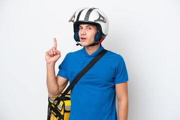 Young caucasian man with thermal backpack isolated on white background thinking an idea pointing the finger up