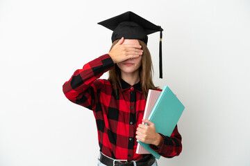 Young English student woman isolated on white background covering eyes by hands. Do not want to see something