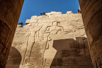 Different hieroglyphs on the walls and columns in the Karnak temple. Karnak temple is the largest...