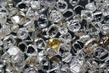 Closeup a pile of natural rough diamond crystal
