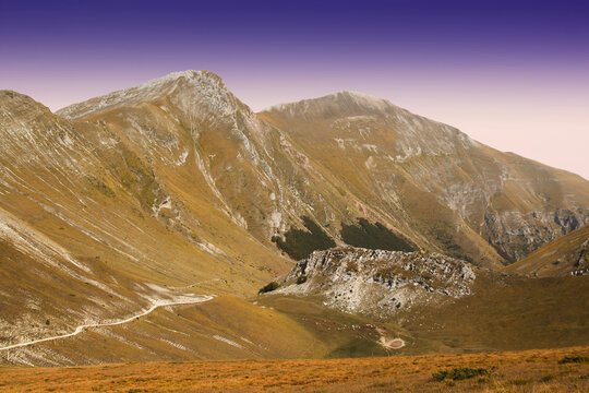 View of the peak of Pizzo Berro and Mount Priora at sunset in Italy