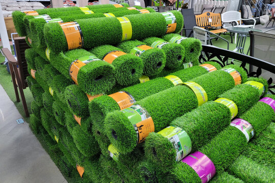 PENANG, MALAYSIA - 18 JUNE 2022: Artificial grass mat selling in HomePro department store. HomePro is a hypermarket of home product and building construction in Malaysia.