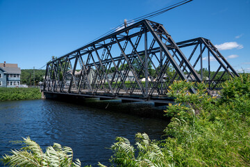 Bridge in Turns Falls Mass. on a bright sunny day