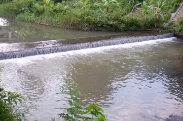 water flowing into the river