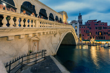 The Rialto Bridge and the Grand Canal in Venice on a summer evening © skovalsky