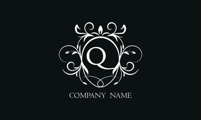 Elegant floral monogram with decorative elements and the letter G. Template for invitations, labels, business. Wedding monograms. Exquisite calligraphic ornament.