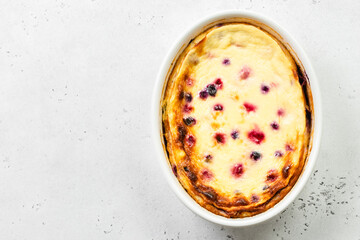 Healthy cottage cheese berry casserole, cheese cake. Top view, copy space, top view.