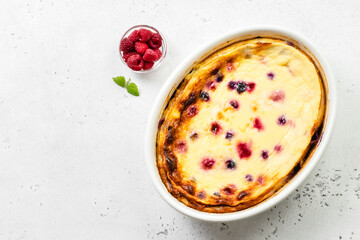 Creamy berry cottage cheese casserole, cheese cake. Top view, copy space, top view.
