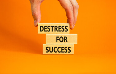 Destress for success symbol. Concept words Destress for success on wooden blocks. Doctor hand....