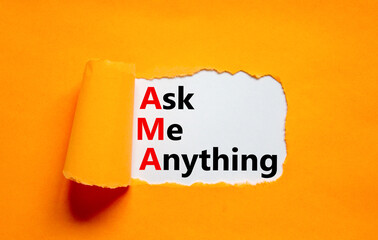 AMA ask me anything symbol. Concept words AMA ask me anything on white paper on a beautiful orange background. Business and AMA ask me anything concept. Copy space. - obrazy, fototapety, plakaty