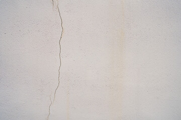 ひびの入った白壁の背景素材