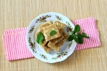 popular indian gujarati traditional sweet sukhdi or gol papdi,in india state wise various name of...