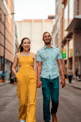 beautiful couple walking while holding hands