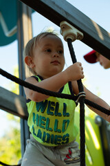 a small child is playing on the playground