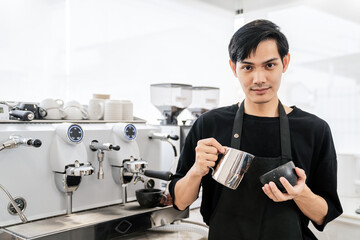 Startup successful small business owner sme man, handsome asia boy use coffee machine in coffee...