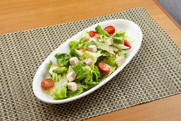 Tofu Salad served in a dish isolated on wooden table background side view of singapore food