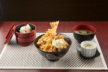 Tar Tar Chicken and Ebi Manzoku Don served in a dish isolated on wooden table background side view of singapore food