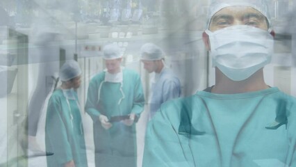 Animation of timelapse with walking people over biracial male surgeon in face mask - Powered by Adobe