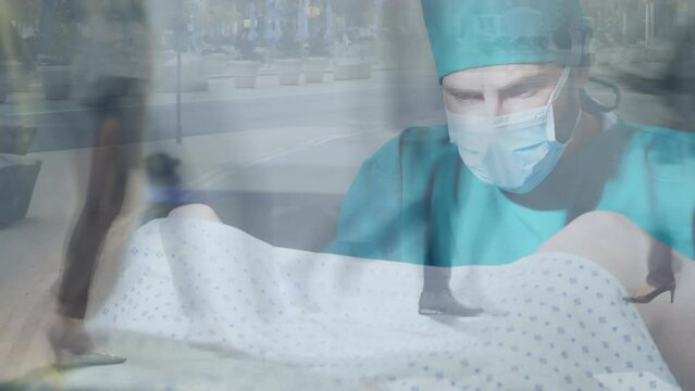 Animation of timelapse with walking people over team of surgeons during operation