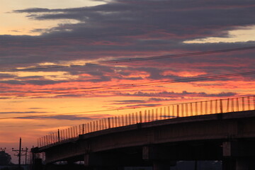 Naklejka na ściany i meble sunset over the bridge