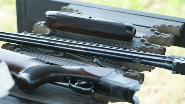 Hunting rifle and bullets. Shotgun. Close-up. Sport shooting from a gun in a shooting range.