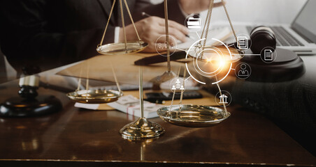 Business and lawyers discussing contract papers with brass scale on desk in office. Law, legal services, advice, justice and law concept picture with film grain effect