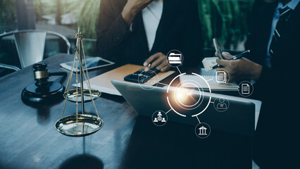 Business and lawyers discussing contract papers with brass scale on desk in office. Law, legal services, advice, justice and law concept picture with film grain effect
