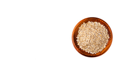Oat flakes in the wooden bowl - Avena sativa