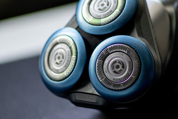 Macro close-up of electrical shaver blades triple technology for perfect wet and dry beard trimming...