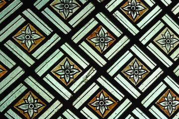 Stain Glass Pattern detail squares  and flower in black white and gold.