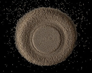 Active dry yeast granules isolated on black, top view 