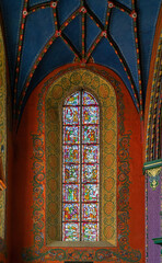 Fototapeta na wymiar Gothic stained glass window. Cathedral of St. Martin's and St. Nicholas, Bydgoszcz