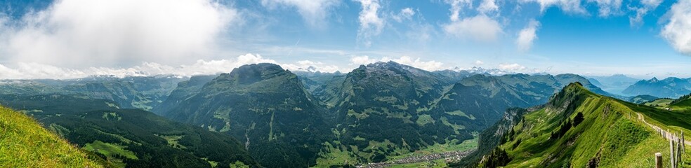 Naklejka na ściany i meble Incredible view on Swiss Alps as seen from ridge in Hoch Ybrig