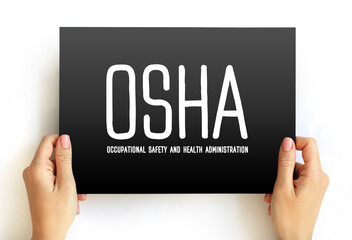 OSHA - Occupational Safety and Health Administration acronym, text concept on card