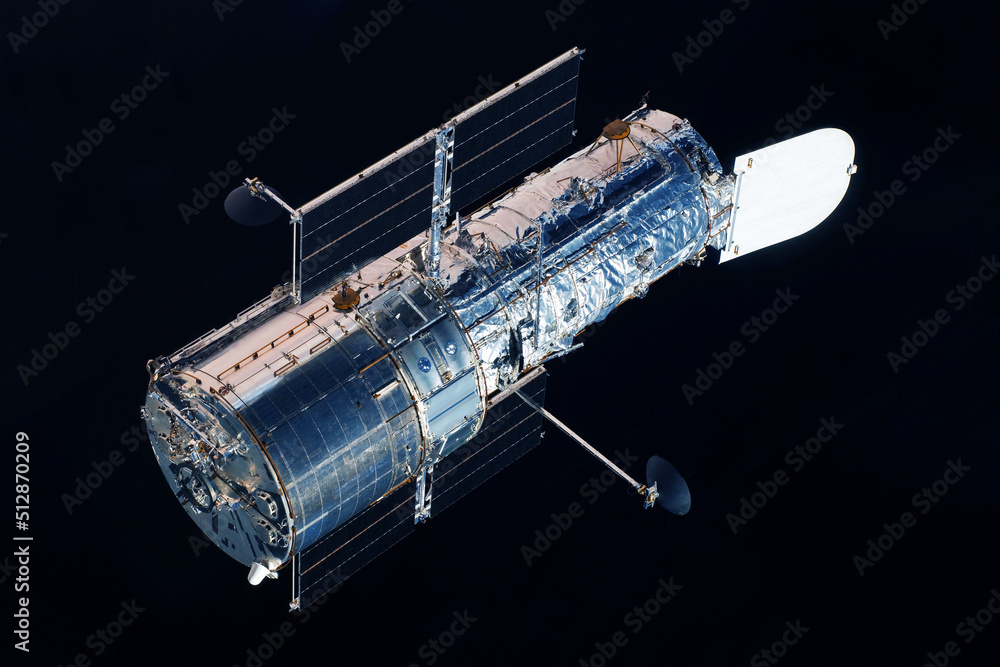 Wall mural space telescope on a dark background. elements of this image furnished by nasa