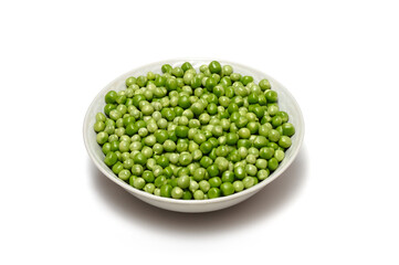 Fresh shelled peas in a plate. Isolated image
